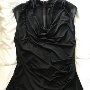 Fitted flattering back shirt w/ leather shoulders!